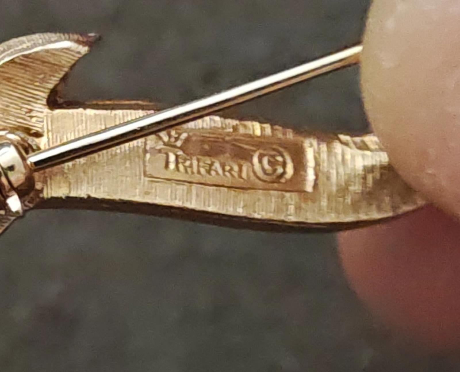 Gold-tone brooch clasp and pin back with TRIFARI stamped mark