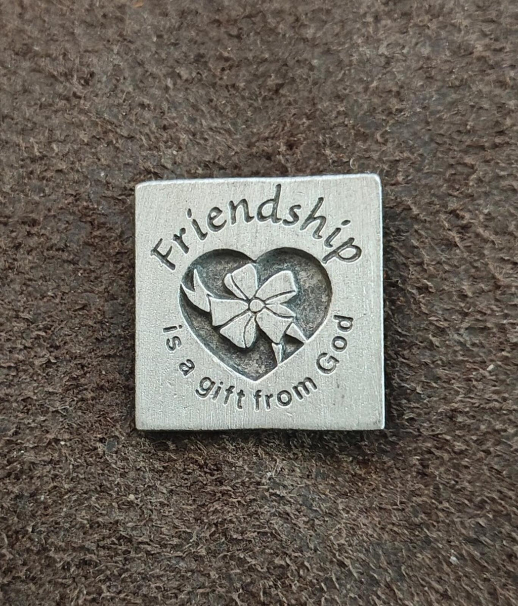 Silver square friendship pin with engraved heart and flower design