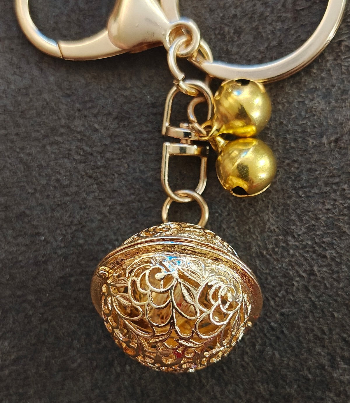 Gold Tone Filigree Chime Ball Keychain