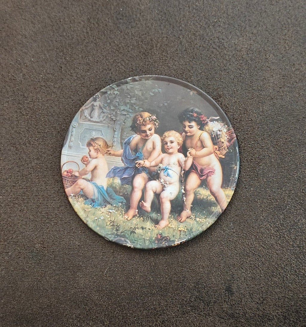 Trippie’s Inc 1995 Cherubs at Play Metal Coaster - Hans Zabateri Putti Angel Art