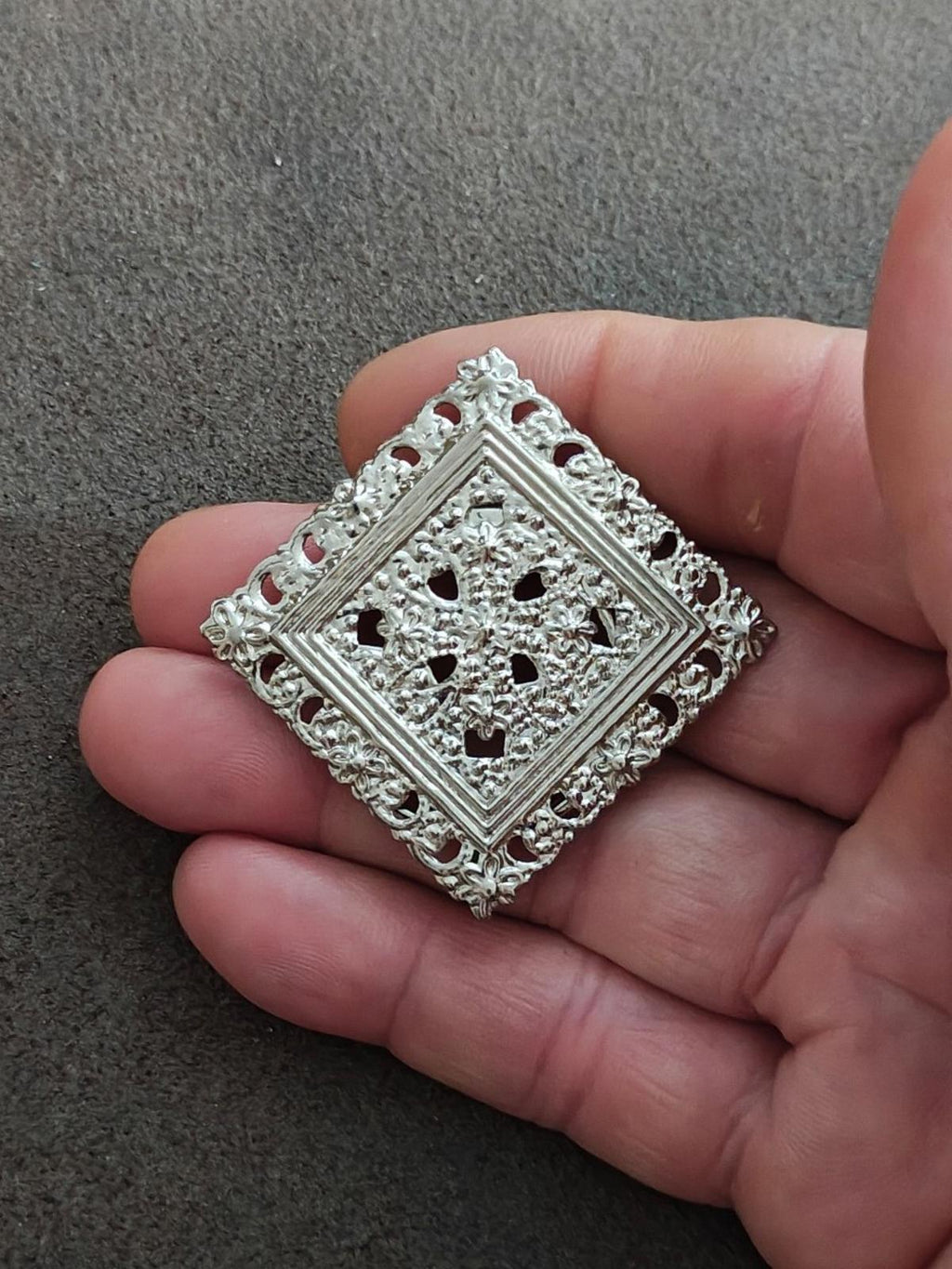 Silver-tone square filigree scarf clip with detailed openwork centerpiece