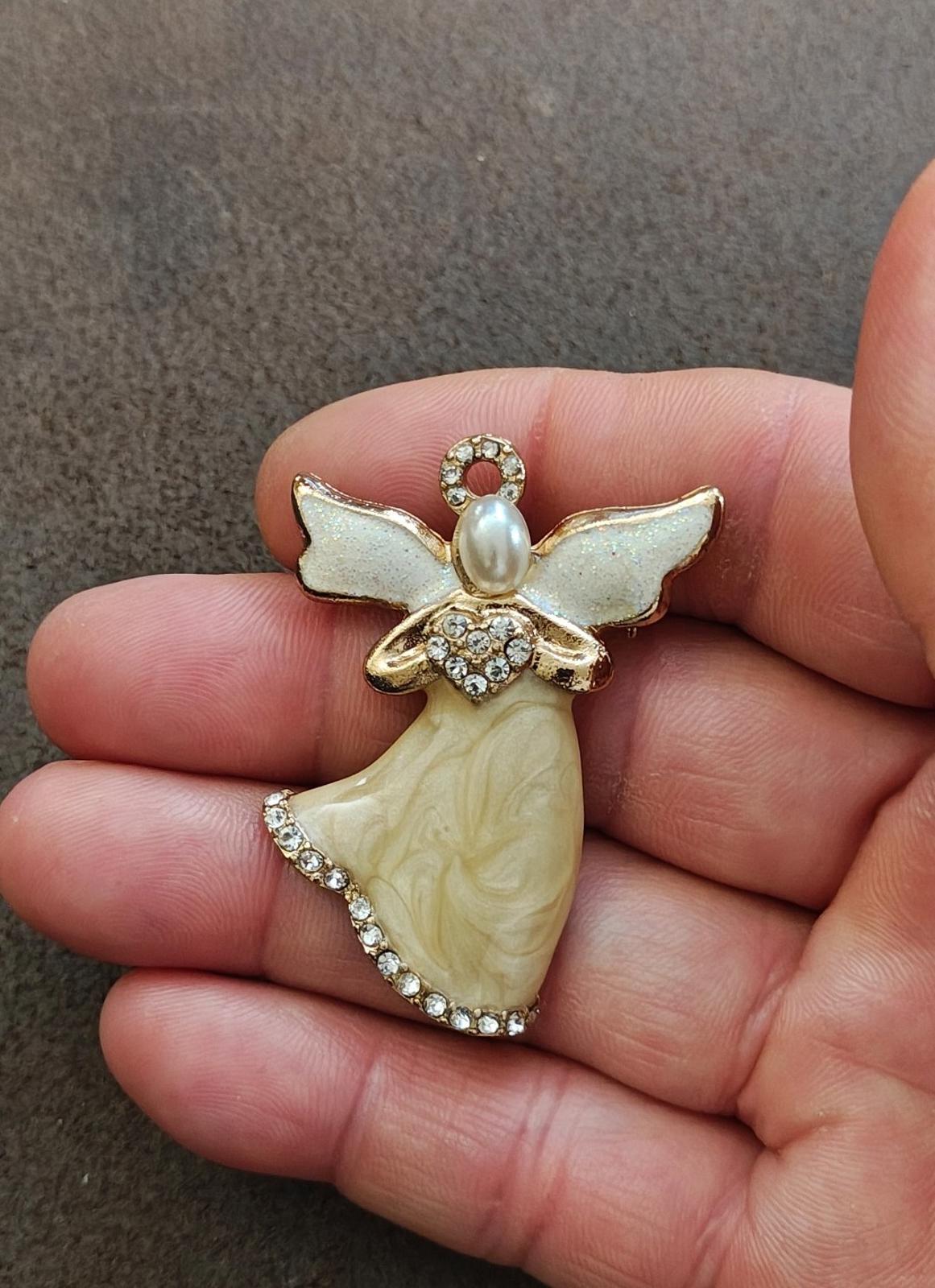 1980s Signed KC (Kenneth Cole) Pearlized Enamel Angel Gold Tone Brooch