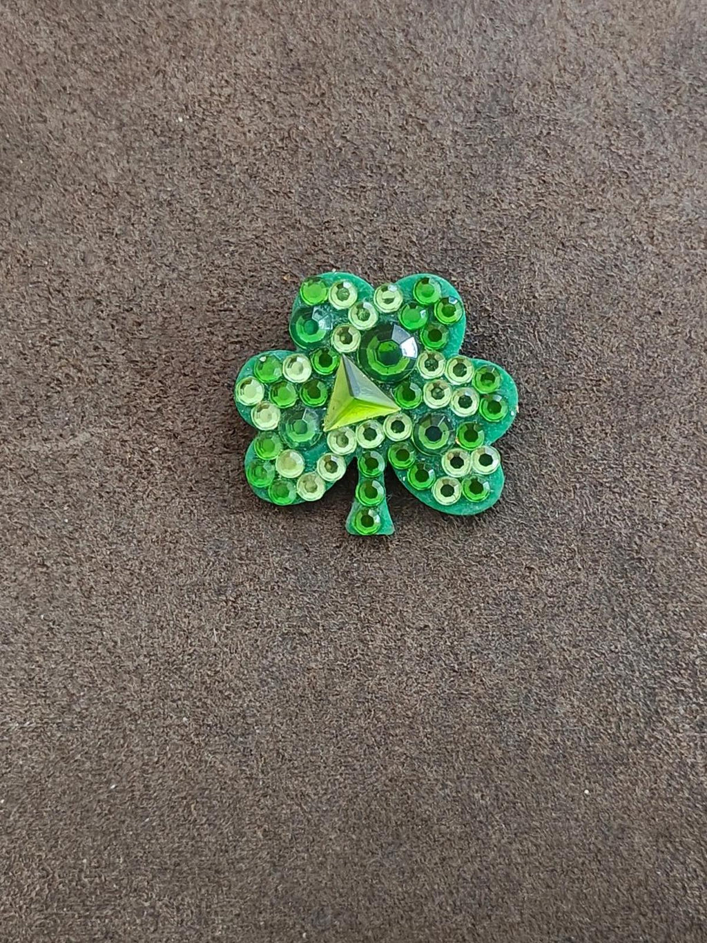 Green rhinestone shamrock brooch pin with sparkling stones and small center star