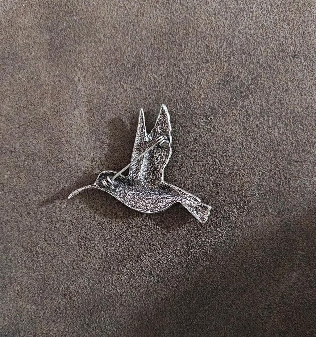 Silver-tone hummingbird brooch pin back with hinged clasp and pin needle