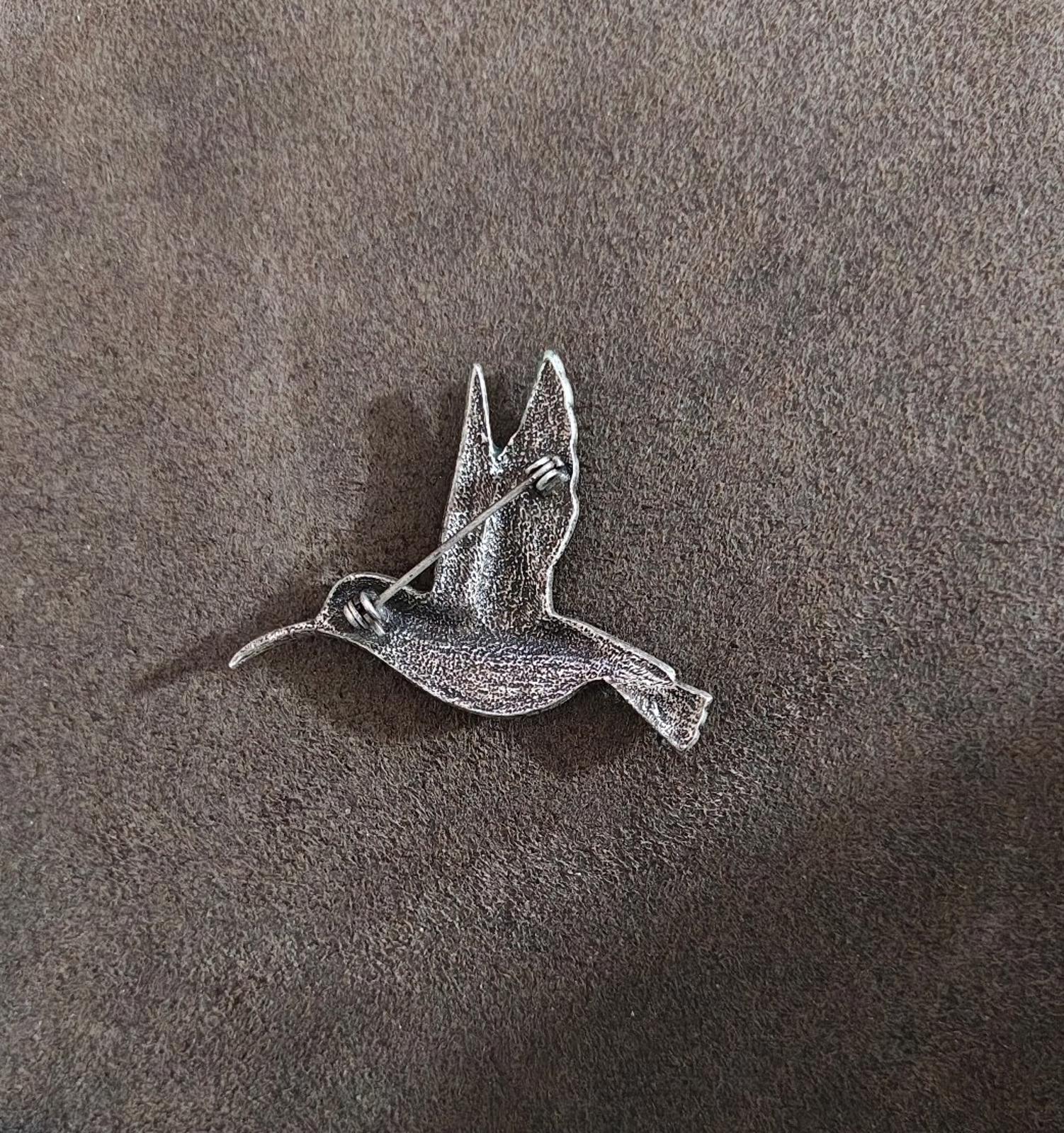 Silver-tone hummingbird brooch pin back with hinged clasp and pin needle