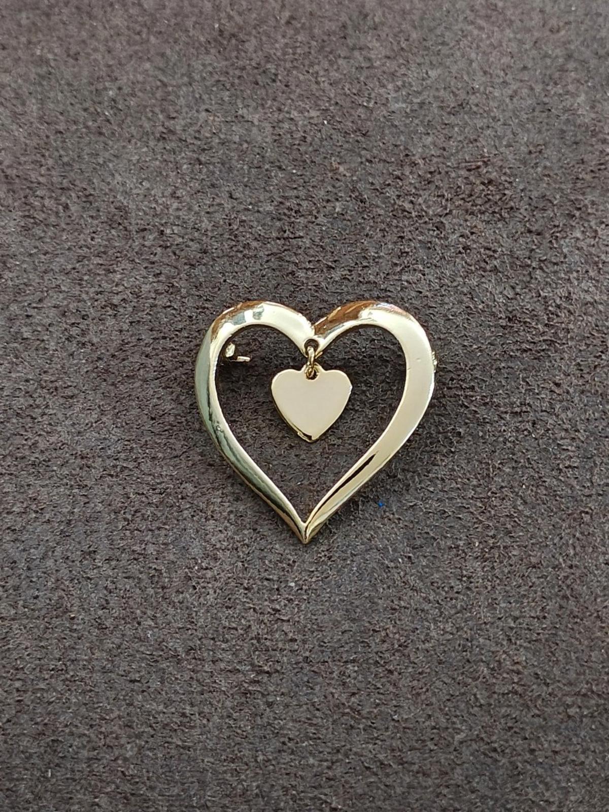 1980s Gold Tone Open Heart With a Smaller Heart Charm Dangle Brooch