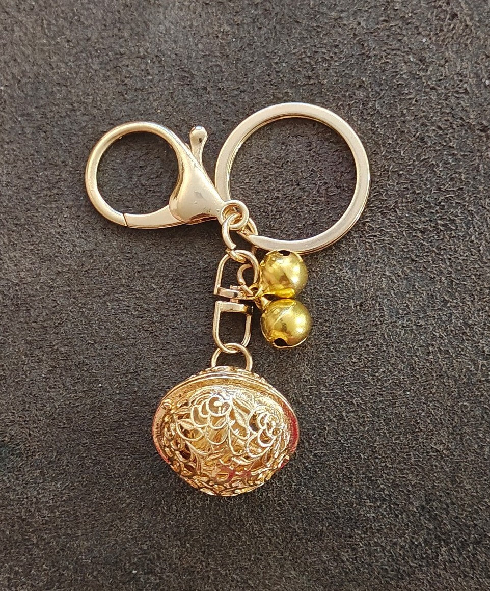 Gold Tone Filigree Chime Ball Keychain
