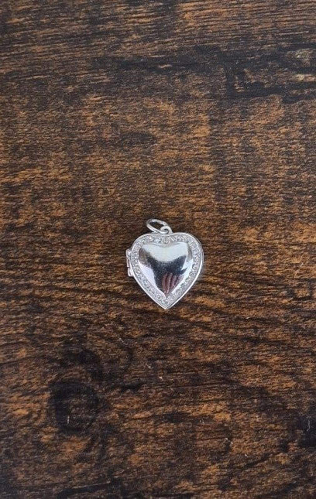 2004 Avon Silver and Clear Rhinestones Heart Locket Pendant