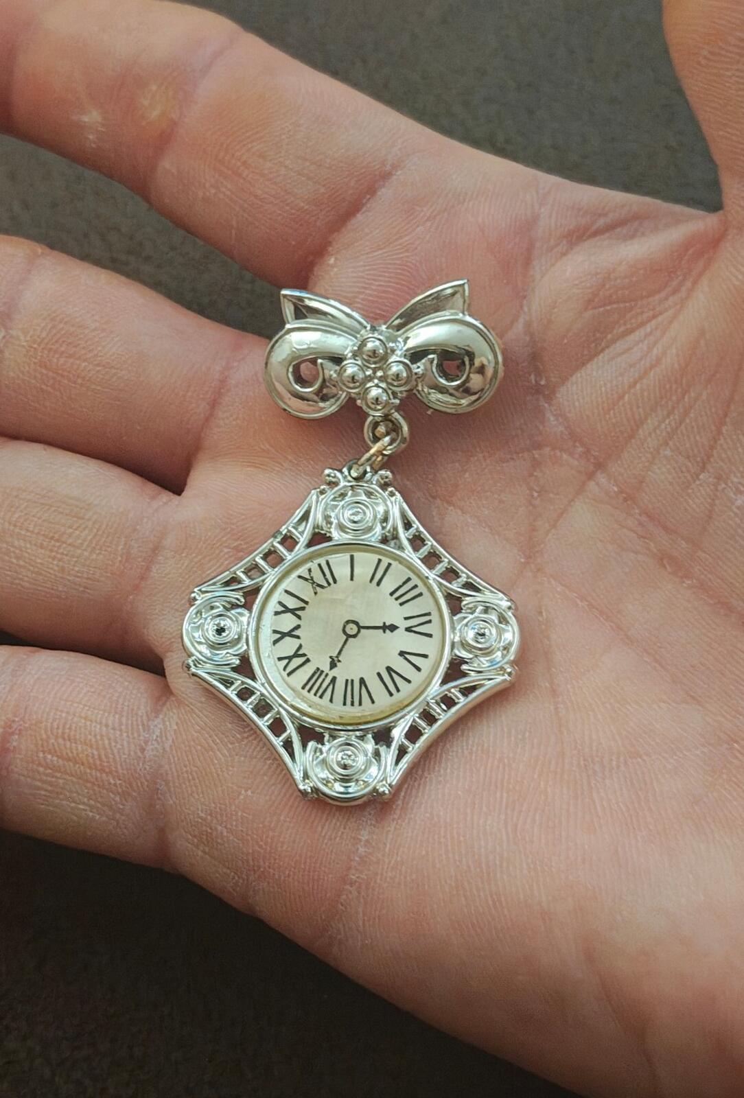 1980s Silver Tone Art Deco Style Bow Clock Motif Dangle Brooch