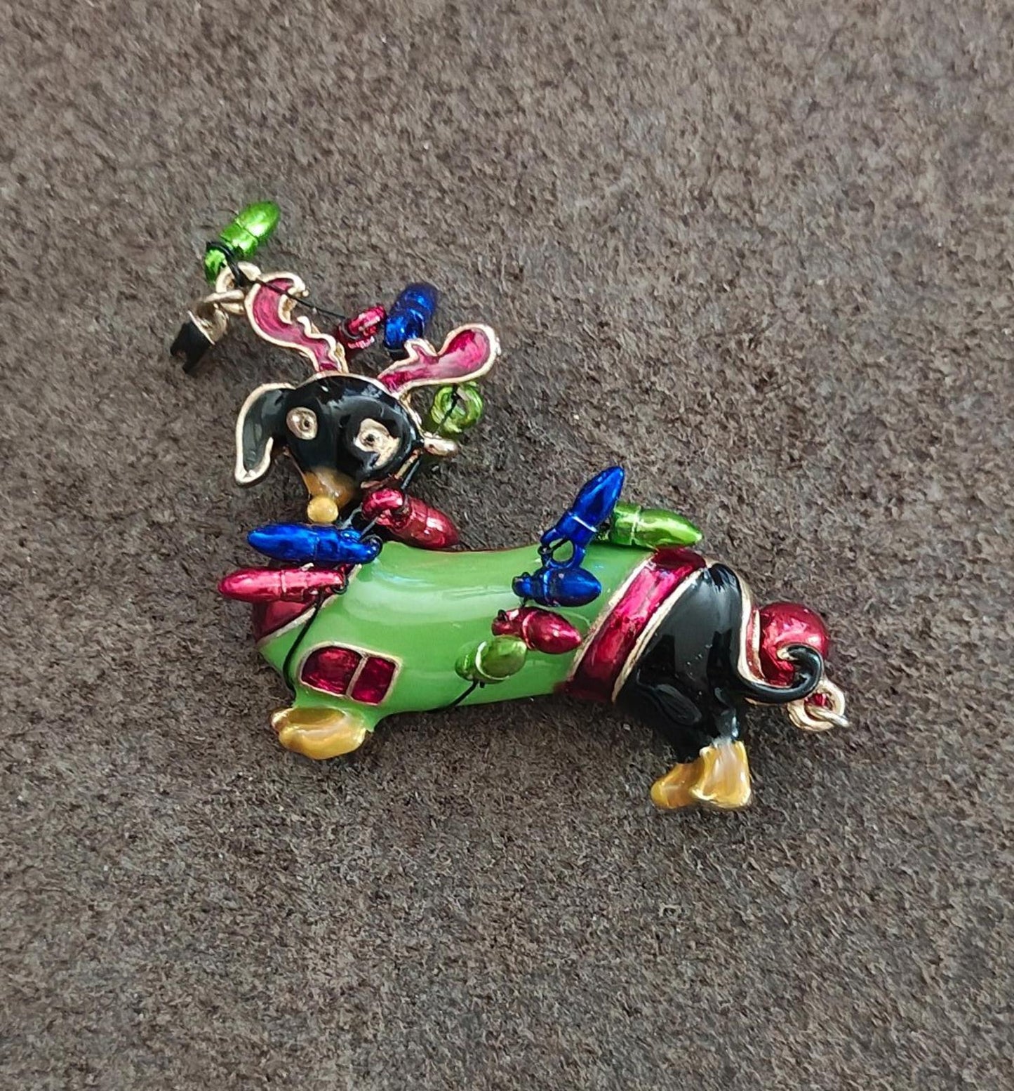 Dachshund Dog Wearing Reindeer Antlers and Wrapped In Colorful Lights Brooch