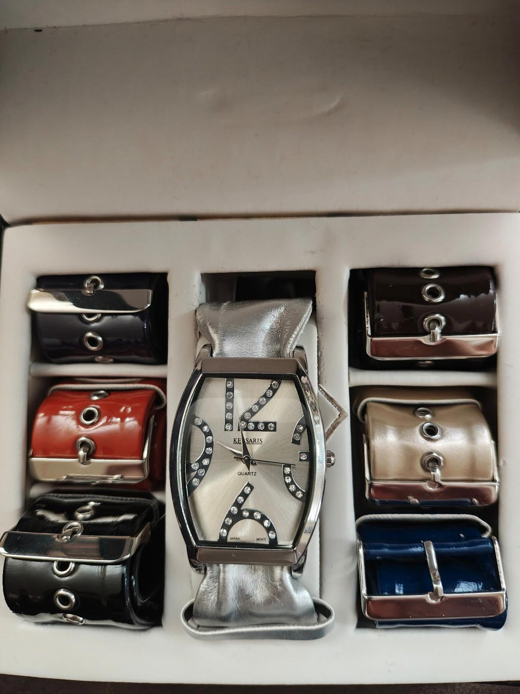 KESSARIS ladies quartz watch with silver strap surrounded by interchangeable strap options