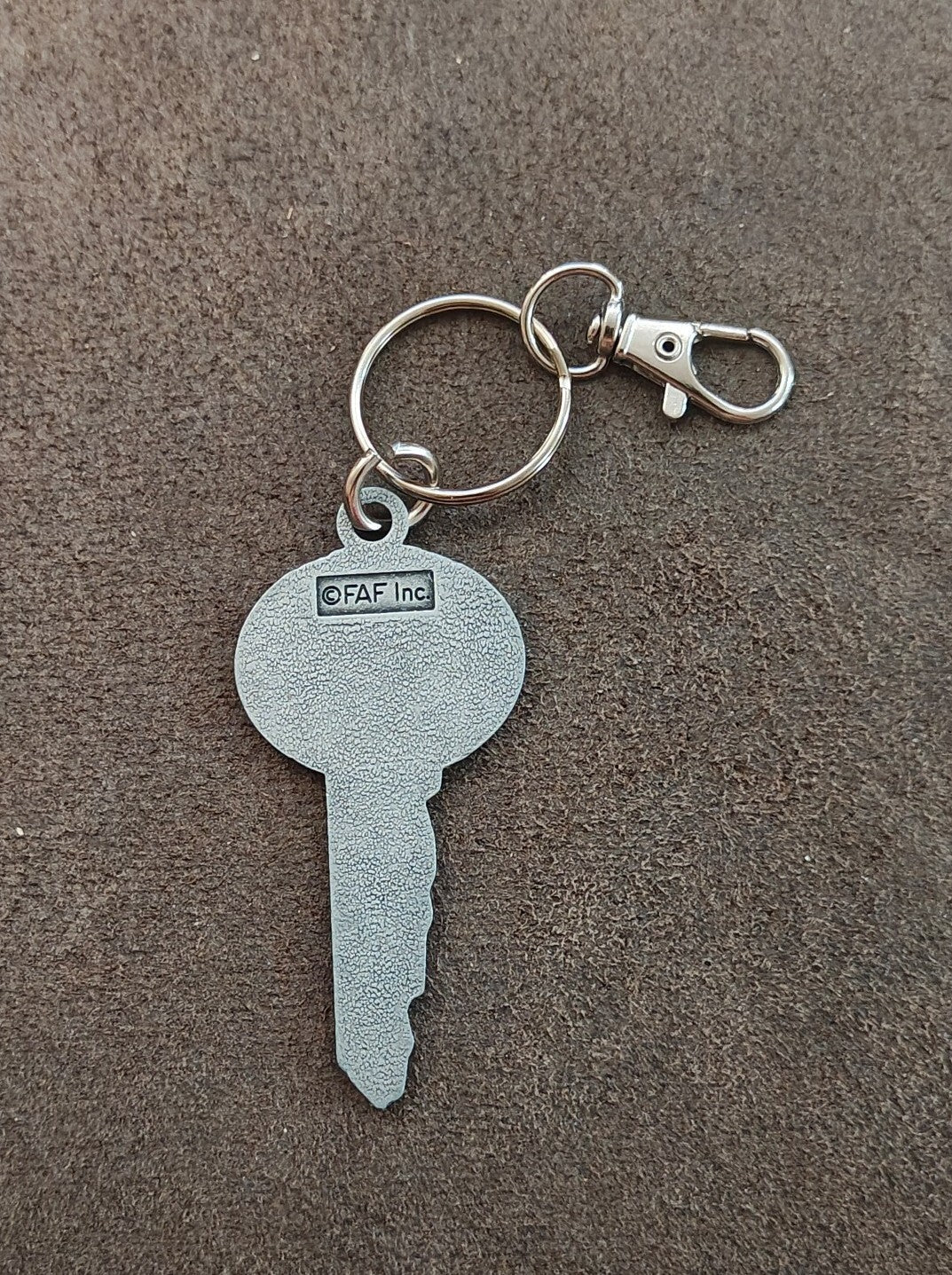 "God never shuts one door without opening another." Cast Metal Keychain