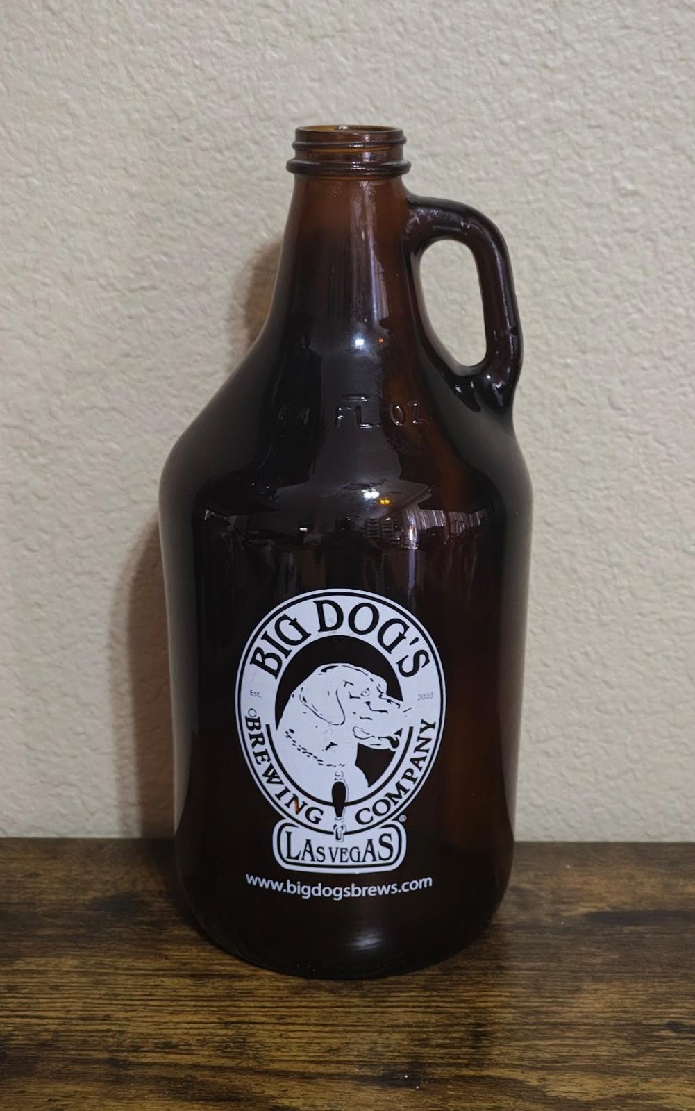 Amber glass jug with side handle and Big Dog's Brewing Company Las Vegas logo