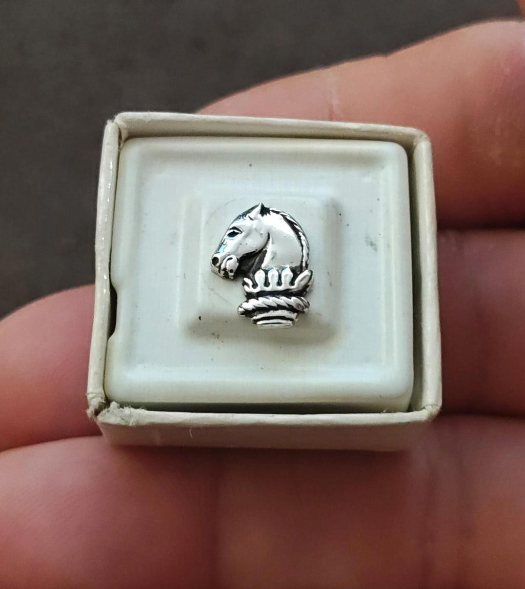 Silver-tone horse head tie tack pin with textured mane and decorative base