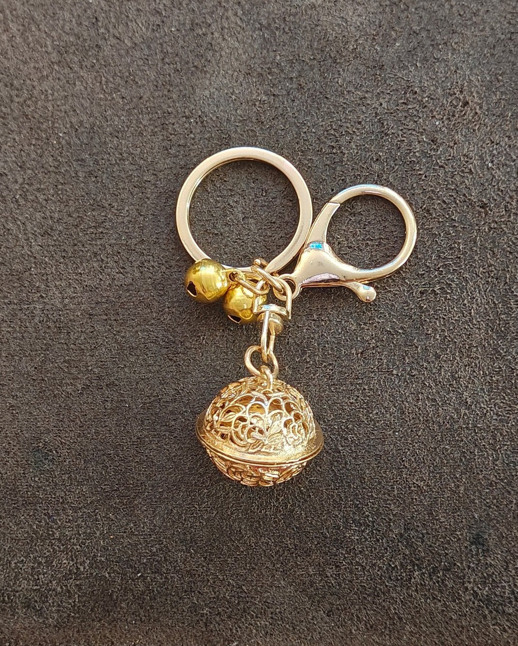 Gold Tone Filigree Chime Ball Keychain