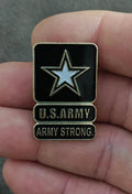 Black U.S. Army enamel star lapel pin with U.S. ARMY and ARMY STRONG text