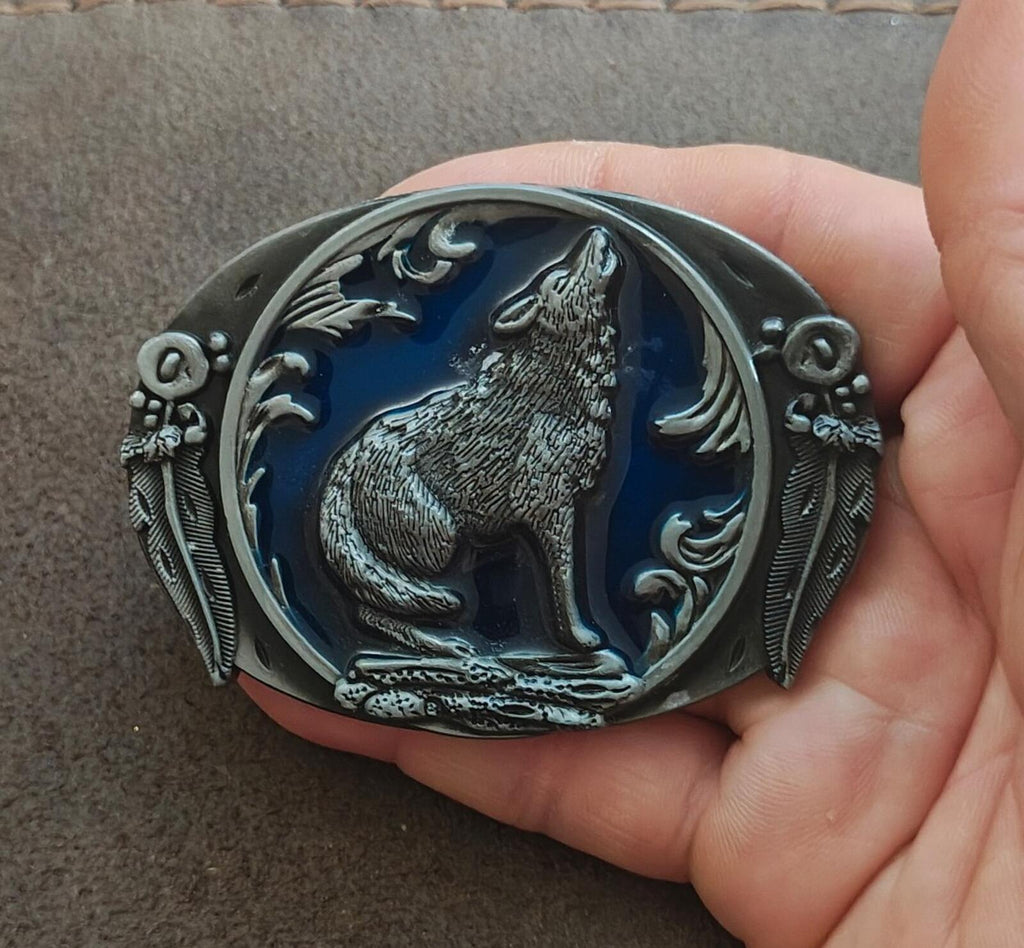 Pewter belt buckle with 3D howling wolf face in blue center and ornate silver border