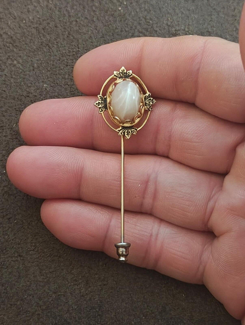 1980s Gold Tone Vintage Stick Pin Featuring a Central Cabochon Gemstone