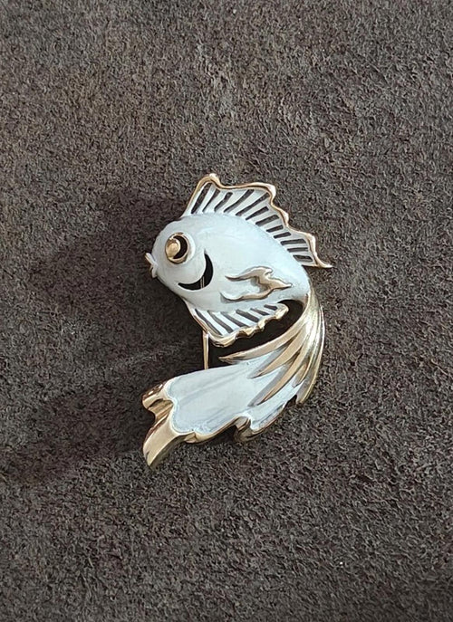 Gold tone and white enamel angel fish brooch pin, side view with needle clasp