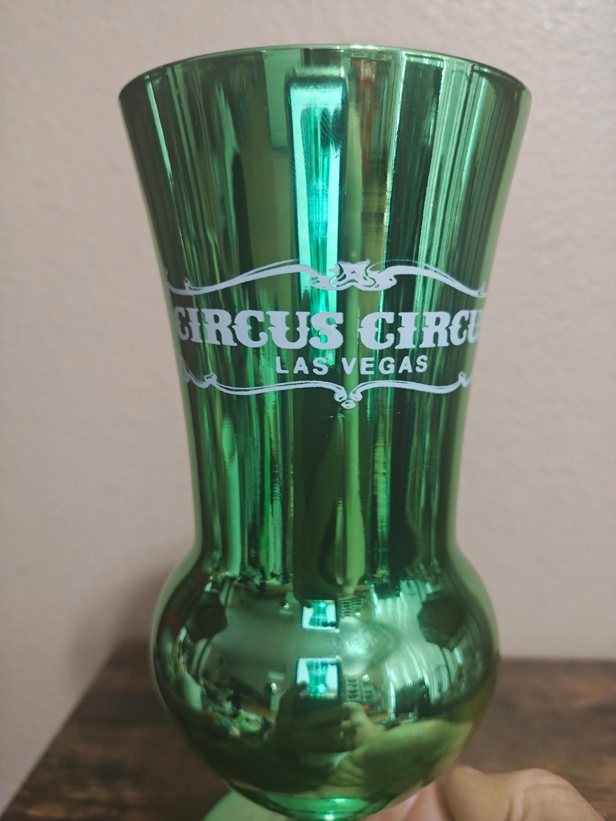 Green mirrored hurricane glass, front view showing Circus Circus Las Vegas logo band.