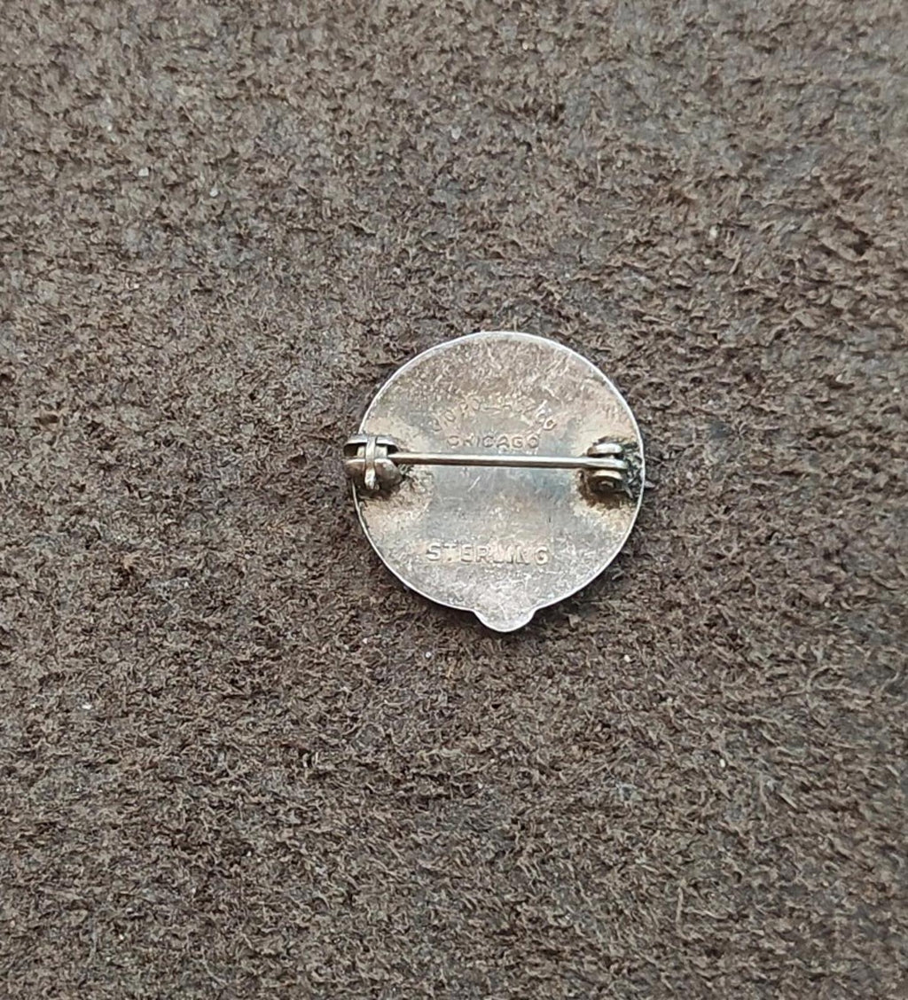 Silver back of service award pin with horizontal safety bar and metal pin clasp