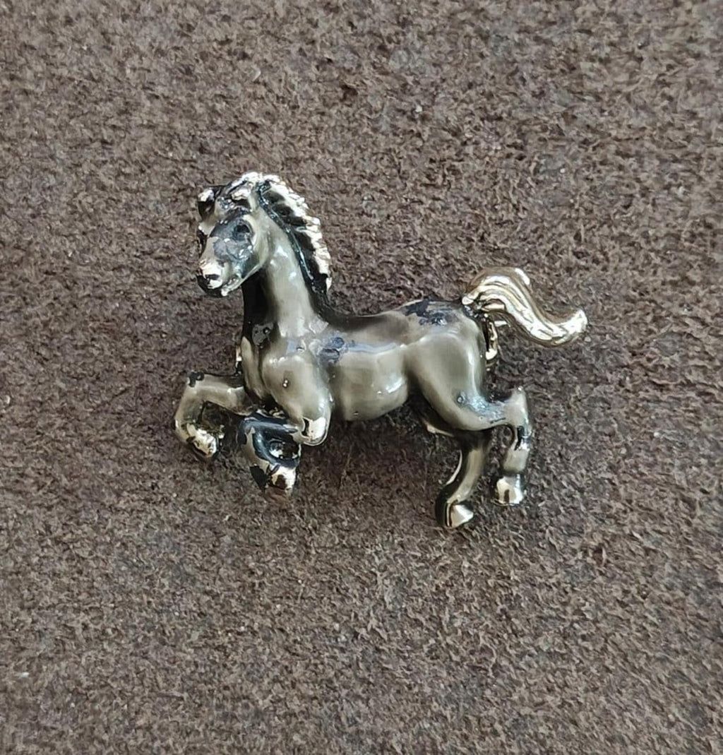 Prancing horse enamel brooch on silver-tone metal, gray and black paint details