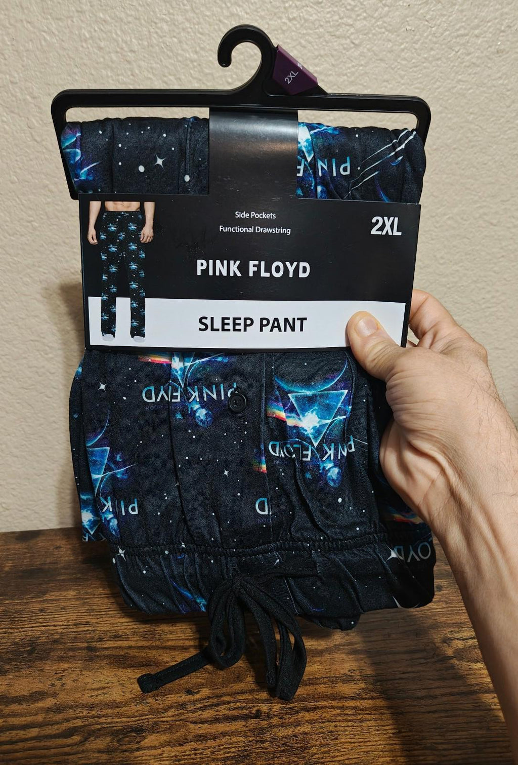 Black graphic sleep pants with drawstring waist and starry blue space print