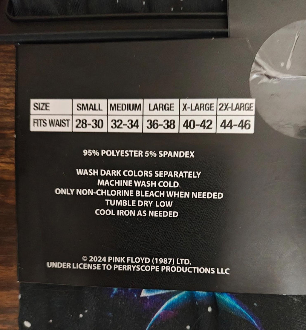 Sleep pant care label with size chart and 95% polyester, 5% spandex