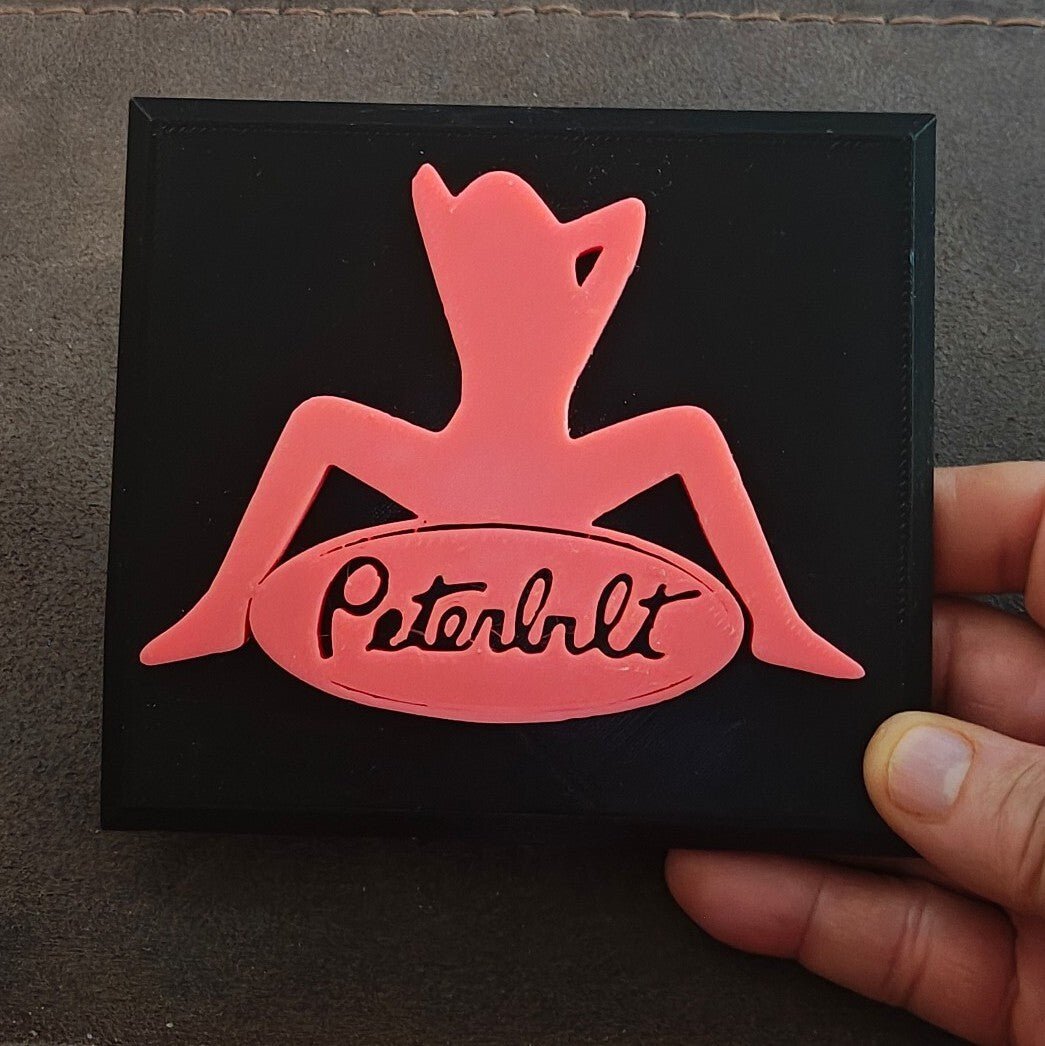 Pink and Black Peterbilt "Mudflap Girl" Emblem Hard Plastic Plaque - Trinketmania-LV