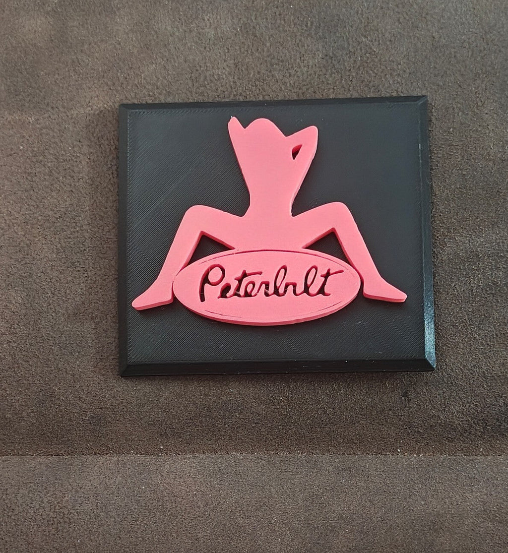 Pink and Black Peterbilt "Mudflap Girl" Emblem Hard Plastic Plaque - Trinketmania-LV